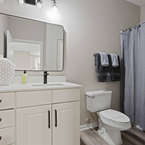 Bathroom with a toilet at Flatiron West Trade in Charlotte, North Carolina