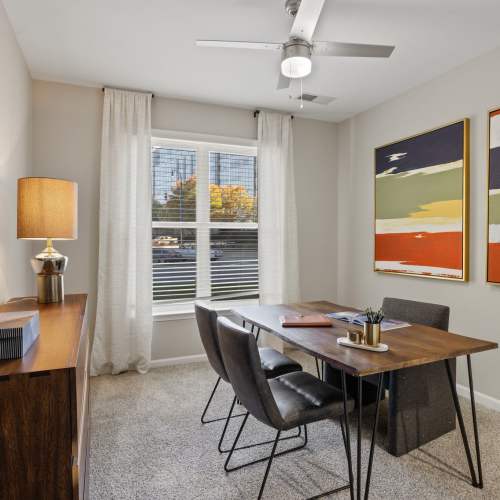 Bedroom with a table at Flatiron West Trade in Charlotte, North Carolina