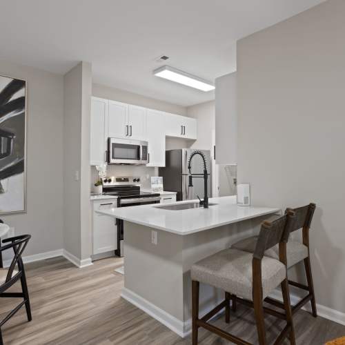 View of the kitchen at Flatiron West Trade in Charlotte, North Carolina