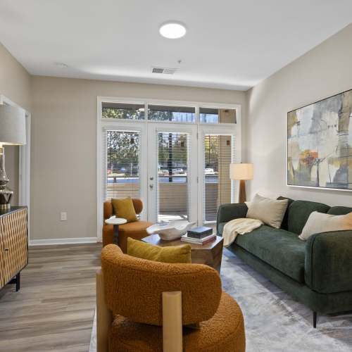 Spacious living room with a couch at Flatiron West Trade in Charlotte, North Carolina