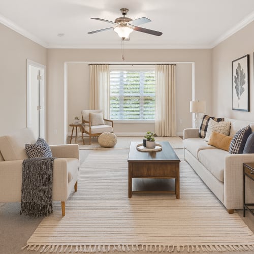 Furnished living room at Avalon At Sweeten Creek in Arden, North Carolina