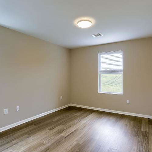 Well-lit bedroom at Normandy Lofts in Shippensburg, Pennsylvania