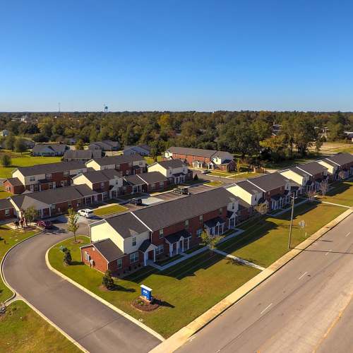 Aerial view of apartment community with landscaped lawns near Butler Crossing I in Kingstree, South Carolina