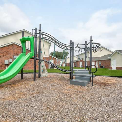 Playground equipment with slide and climbing features at Butler Crossing I in Kingstree, South Carolina