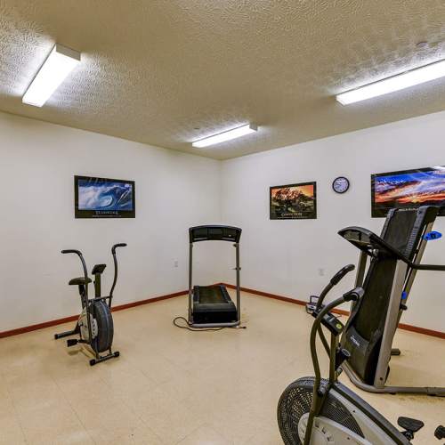 Fitness center with cardio equipment at Beaumont Greene Senior Living in Athens, Ohio