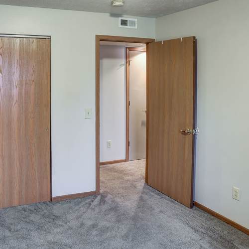Bedroom with carpeted flooring at Riverview Place in Ripley, Ohio