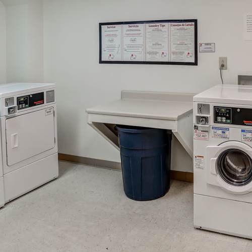 Laundry room with machines at Riverview Place in Ripley, Ohio