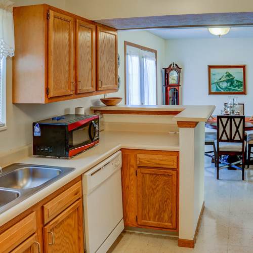 Kitchen with wooden cabinets at Zacharys Crossing in Washington Court House, Ohio