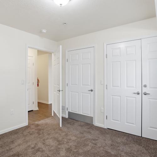 Living room with carpet flooring at Chambersburg Senior Housing in Chambersburg, Pennsylvania