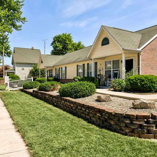 Charming exterior with landscaped garden near Essex Place North in Sycamore, Ohio