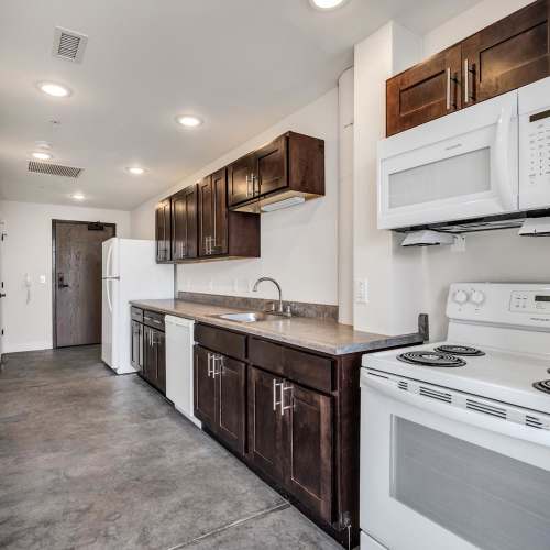 Kitchen with wooden cabinets at Prospect Yard in Cleveland, Ohio 