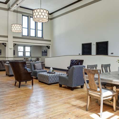 Clubhouse with seating and wooden flooring at Everts Hill Senior Living Apartments in Circleville, Ohio
