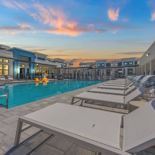 Evergreen-westside-apartments-gainsville-florida-brand-new-luxury-pool-with-lounge-seating