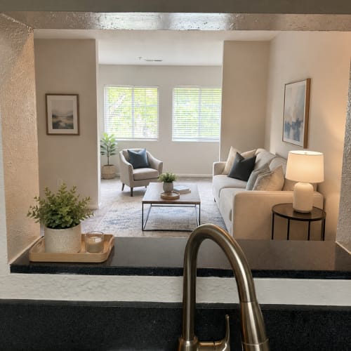 Bright furnished living room at Sabal Palms in Charleston, South Carolina
