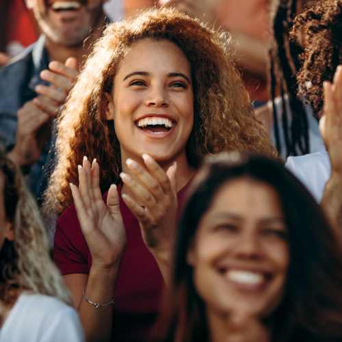 Cheerful crowd enjoying an event at Bayview Student Living in North Miami, Florida