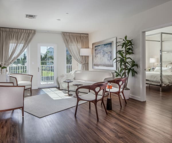 Gorgeous, open living room at All Seasons Naples in Naples, Florida