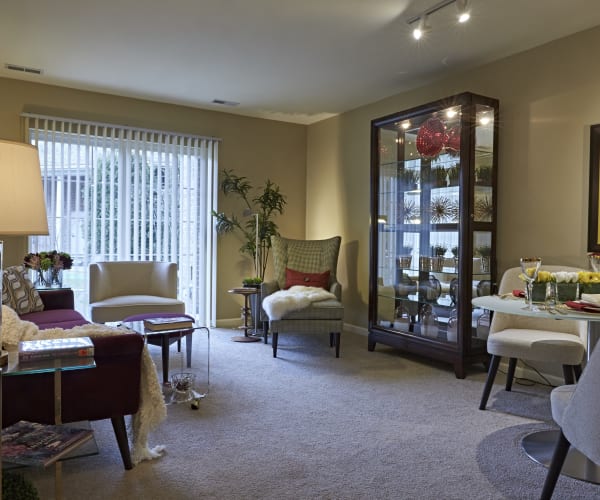 Spacious, comfortable living room at All Seasons of Rochester Hills in Rochester Hills, Michigan