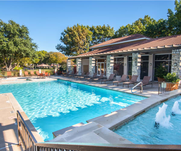 Refreshing swimming pool at Villas of Preston Creek in Plano, Texas