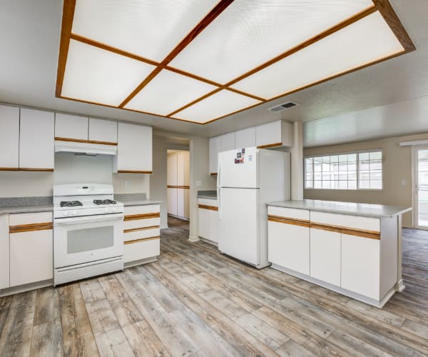 A kitchen in a home at El Centro New Fund Housing (Enlisted) in El Centro, California