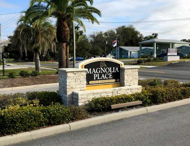Apartment sign board at Magnolia Place in New Port Richey, Florida