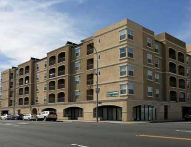 Community building exterior view  at Maywood Villas in Maywood, California