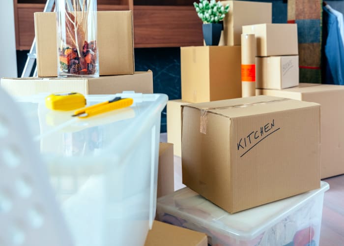 Packing boxes to put into storage in Waukee