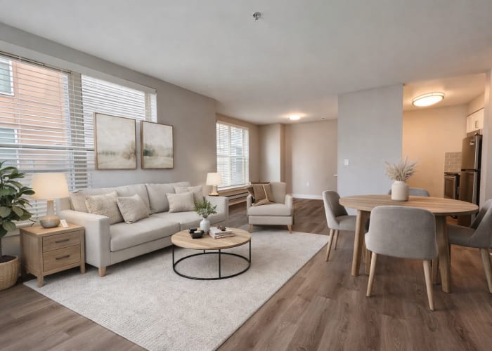 Modern kitchen with stainless-steel appliances in a model home at Vantage Park Apartments in Seattle, Washington