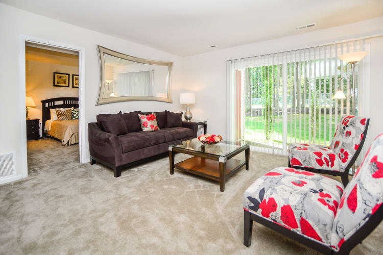 The Landings Apartment Homes offers a naturally well-lit living room in Absecon, NJ