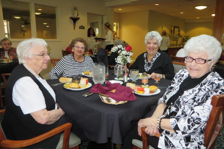 residents being served a salad at Traditions of Hanover in Bethlehem, Pennsylvania