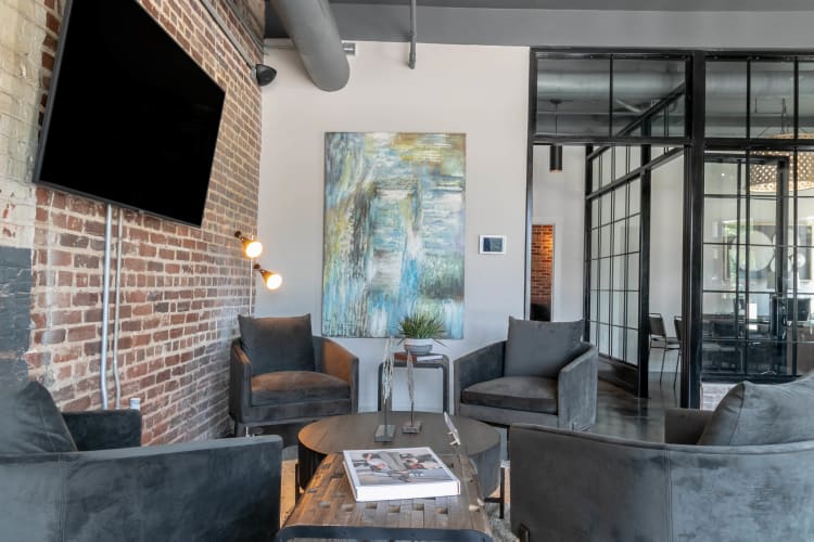 Spacious living room and kitchen at Porterdale Mill Lofts in Porterdale, Georgia