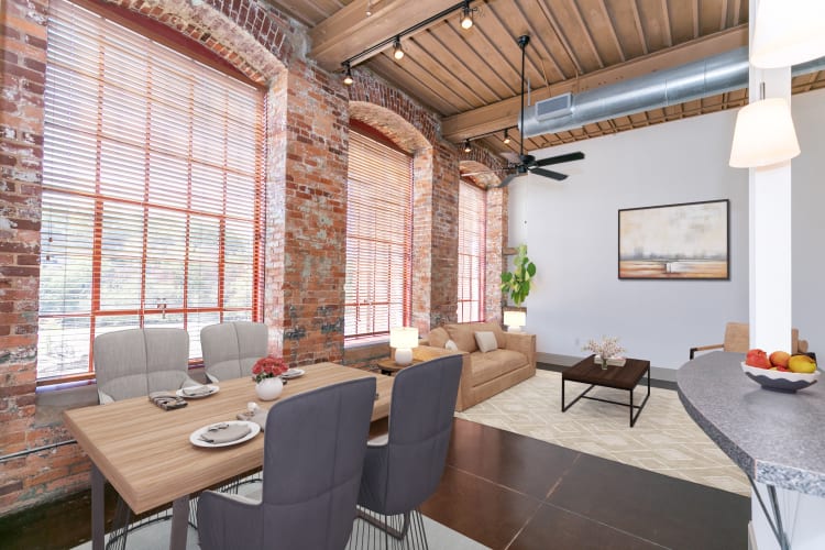 Spacious living room and kitchen at Porterdale Mill Lofts in Porterdale, Georgia