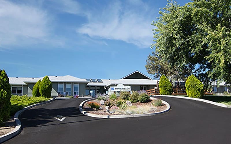 Driveway leading to Regency Redmond Rehabilitation and Nursing Center in Redmond, Oregon