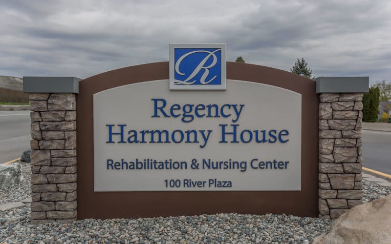 Signage outside at Regency Harmony House Rehabilitation & Nursing Center in Brewster, Washington