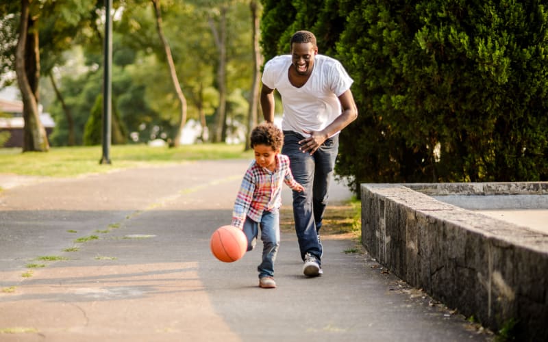 Father and son playing together at DELETED - Ellsworth Apartments in Bridgeport, Connecticut