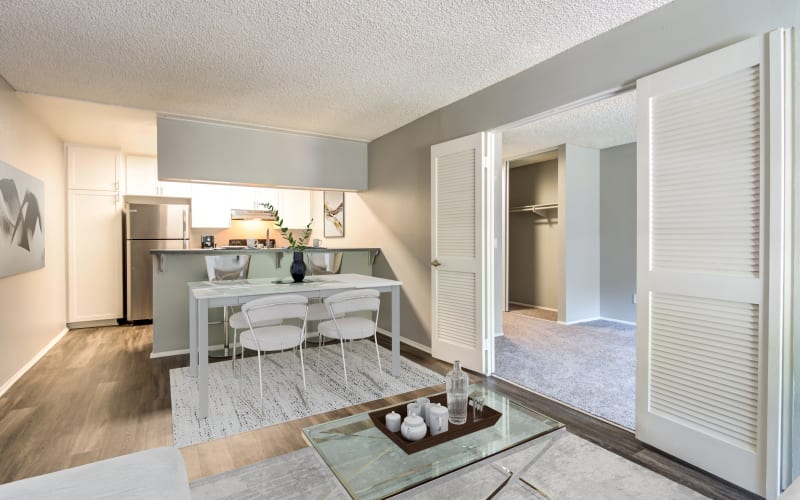 Hardwood-style floors and open, roomy floor plans at Hillside Terrace Apartments in Lemon Grove, California