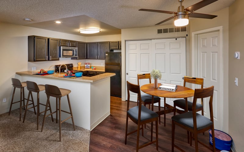 Renovated kitchen with stainless-steel appliances at Bluesky Landing Apartments in Lakewood, Colorado