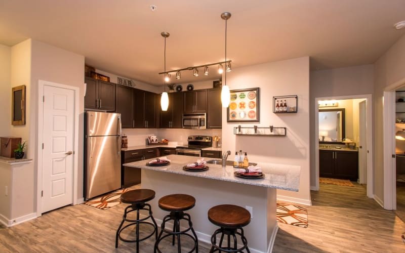 Kitchen area featuring stainless steel appliances at Luxe Scottsdale Apartments in Scottsdale, Arizona