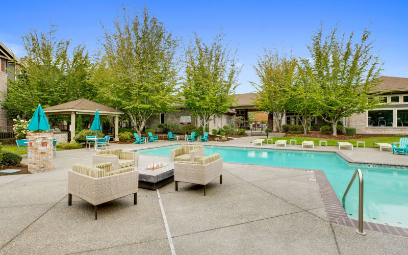 Fire pit lounge area poolside at The Grove at Orenco Station in Hillsboro, Oregon