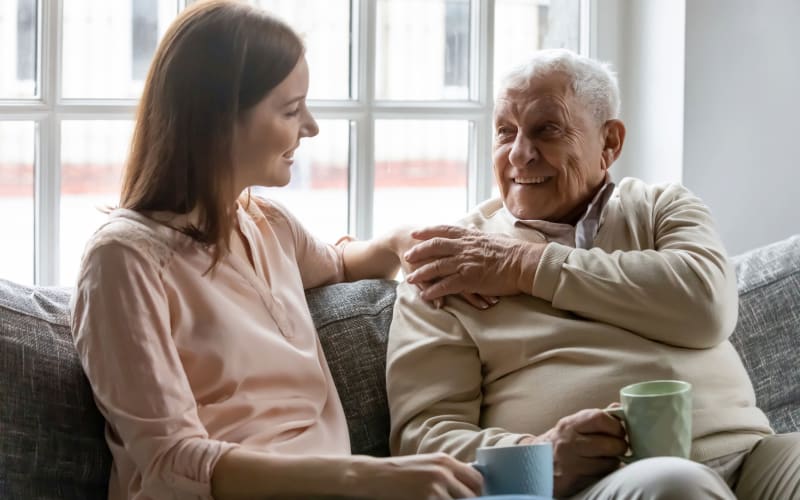 Resident and caregiver talking at Blossom Ridge in Oakland Charter Township, Michigan