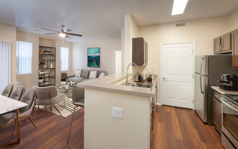 Well organized, renovated kitchen with brown cabinets at Promenade at Hunter's Glen Apartments in Thornton, Colorado