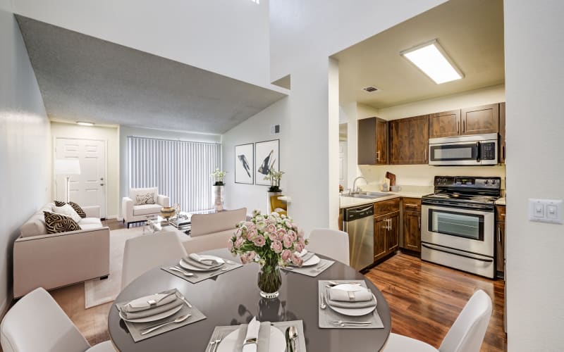 Renovated kitchen with stainless steel appliances at Tuscany Village Apartments in Ontario, California