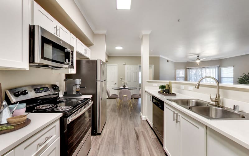 Renovated white kitchen at Avion Apartments in Rancho Cordova, California