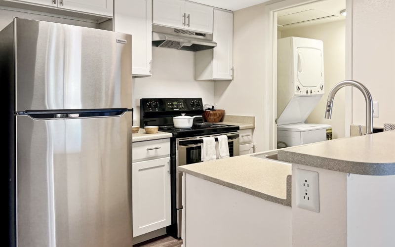 Renovated White Kitchen at Shadowbrook Apartments in West Valley City, Utah