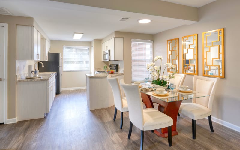 Spacious and bright dining room and kitchen at Villas at Homestead Apartments in Englewood, Colorado