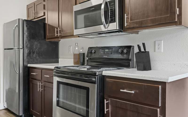 Renovated kitchen with stainless steel appliances at Renaissance at 29th Apartments in Vancouver, Washington