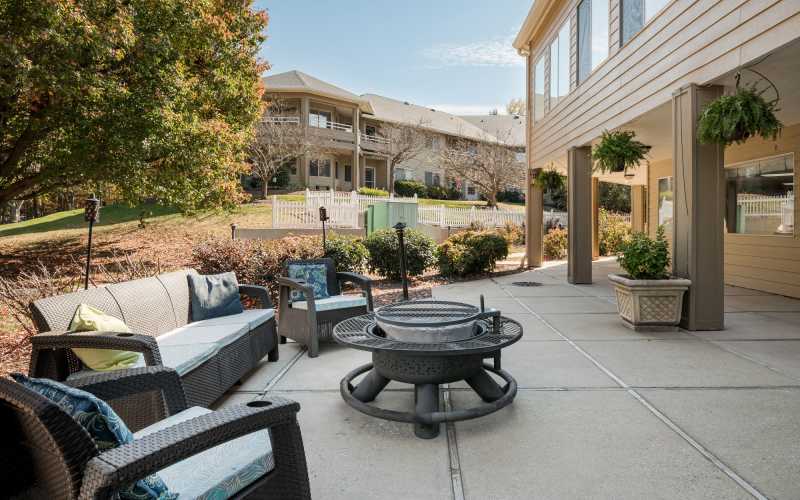 Patio seating with a firepit at Haywood Estates in Greenville, South Carolina