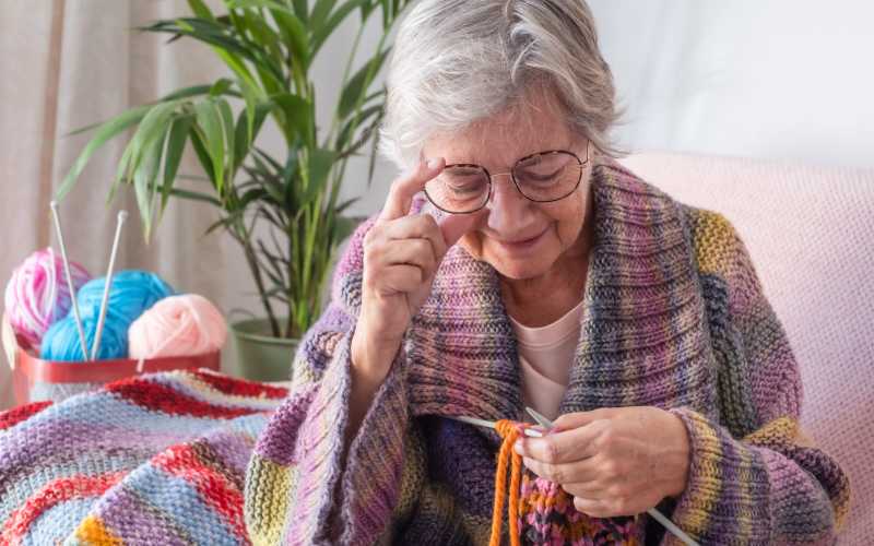 Residents knitting at The Pineapple House at Sapphire Lakes in Naples, Florida