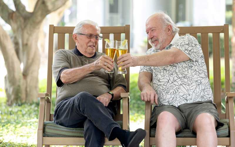 A grandmother garnening with her granddaughter at The Blake at Miramar Beach in Miramar Beach, Florida