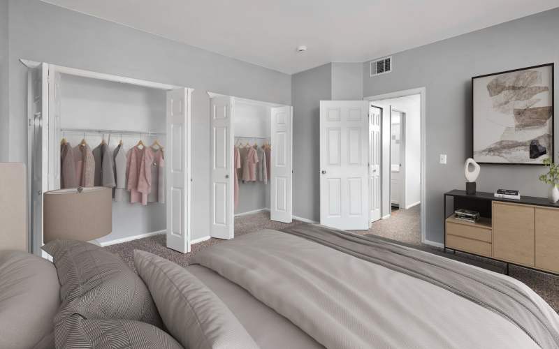 Spacious bedroom with plush carpeting at Westridge Apartments in Aurora, Colorado