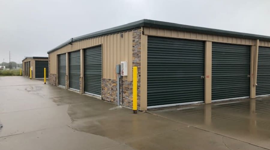 Storage units with green doors and locks at KO Storage of Vermillion in Vermillion, South Dakota